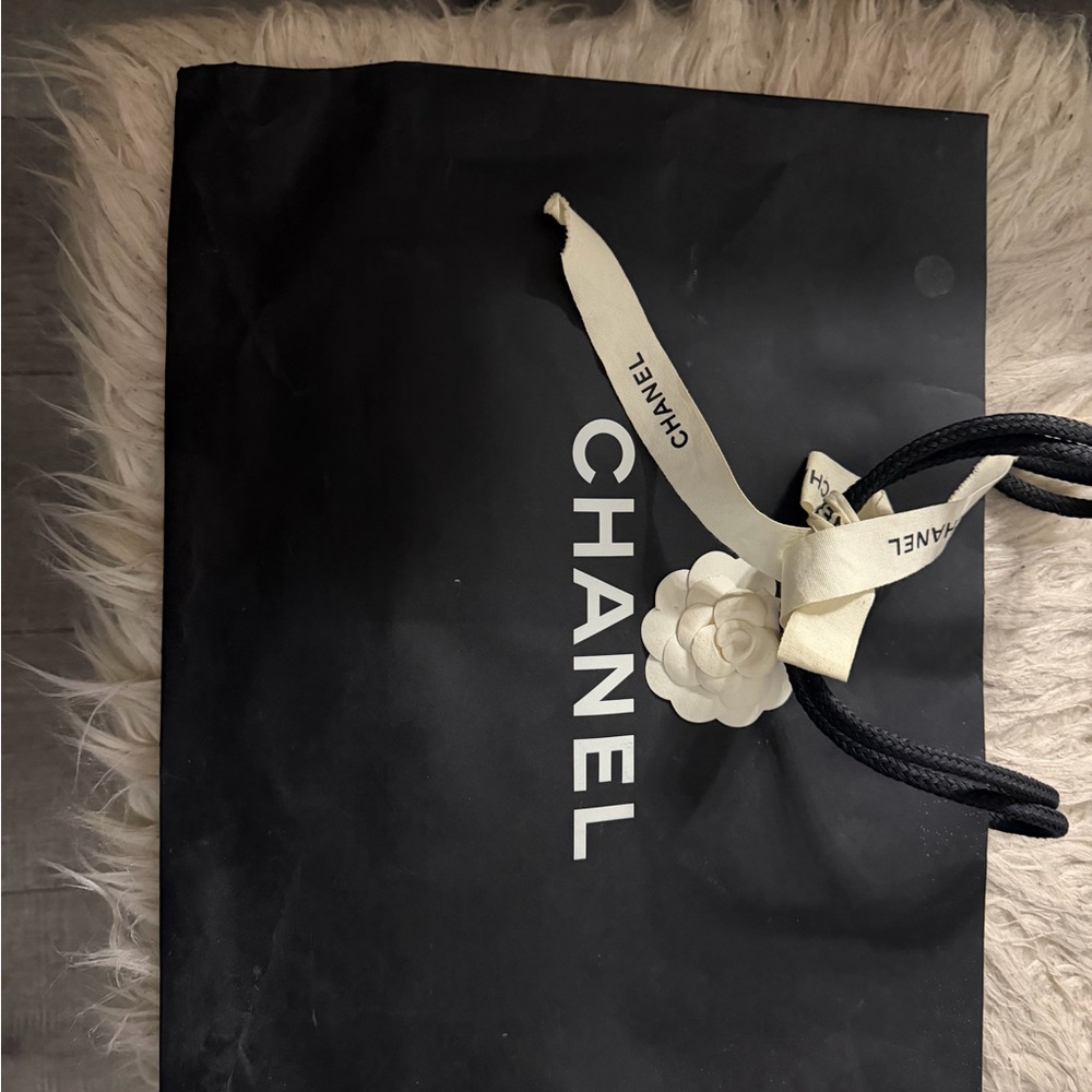 CHANEL Black Bag with White Logo and Ribbon